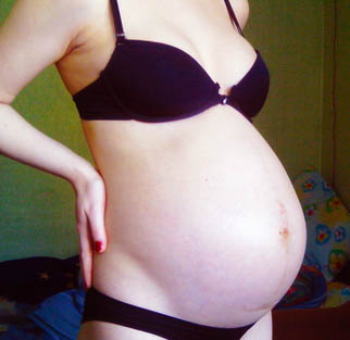 Фото живота на 32 неделе беременности